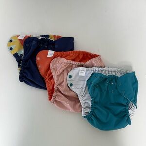 Brand new Esembly diaper covers size 2